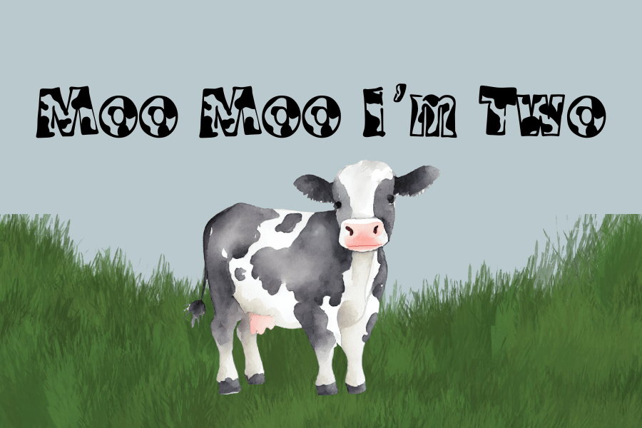 A graphic of a black and white cow on green grass with the words "Moo Moo I'm Two" centered on top of the cow.