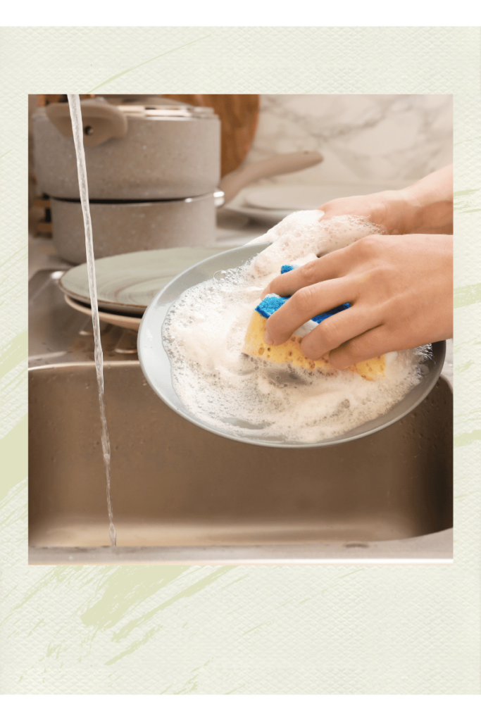 A photograph of some washing a plate in the sink showing the new mom gift ideas of helping clean the house.